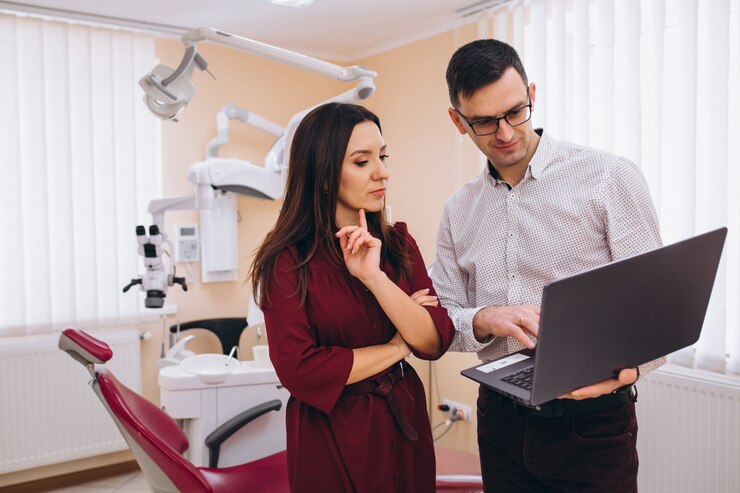 dentist-with-patient-visit_1303-14050
